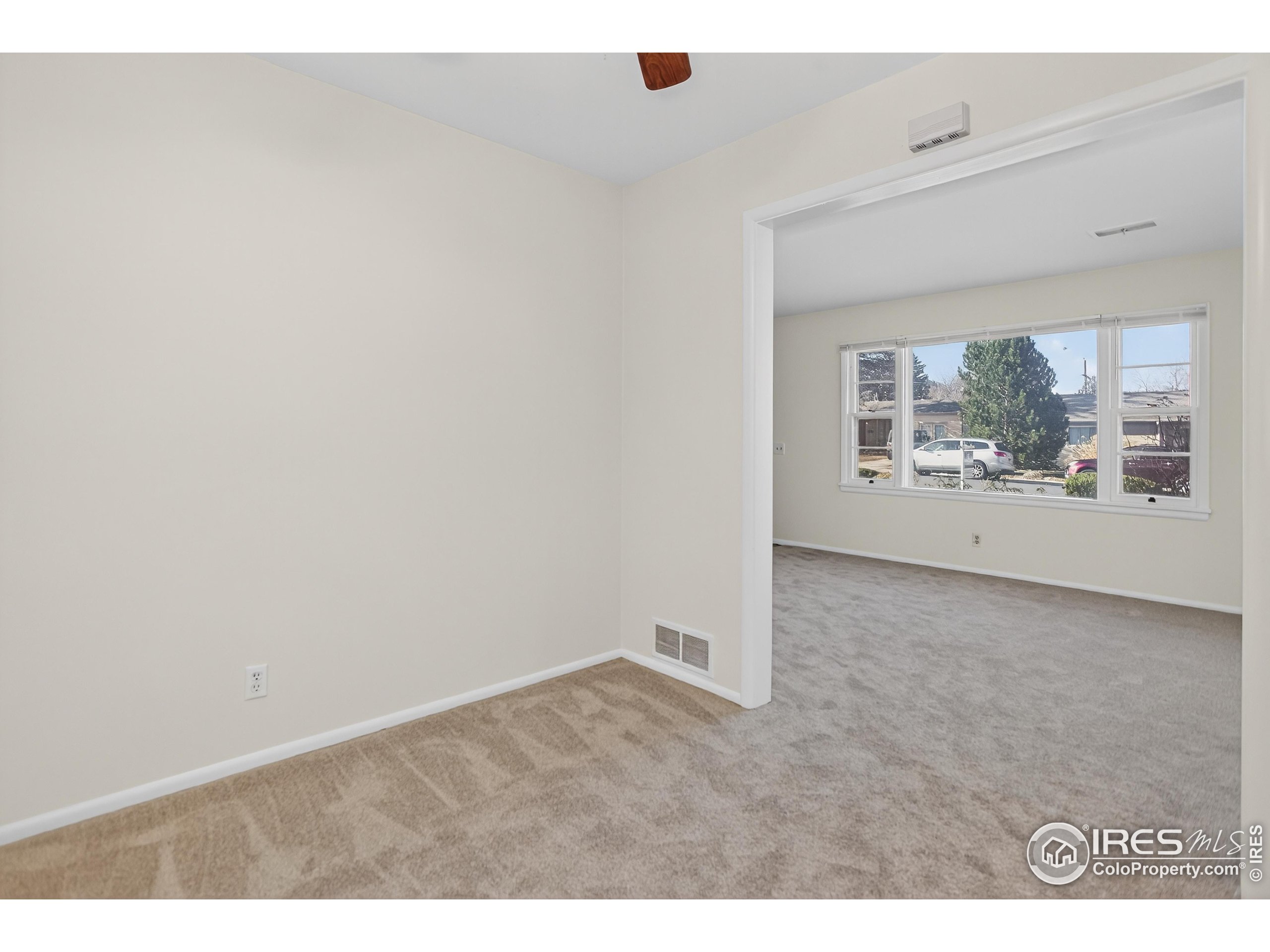 340 29th Street Boulder, CO 80305 - Photo 15 of 39 a view of an empty room with a window