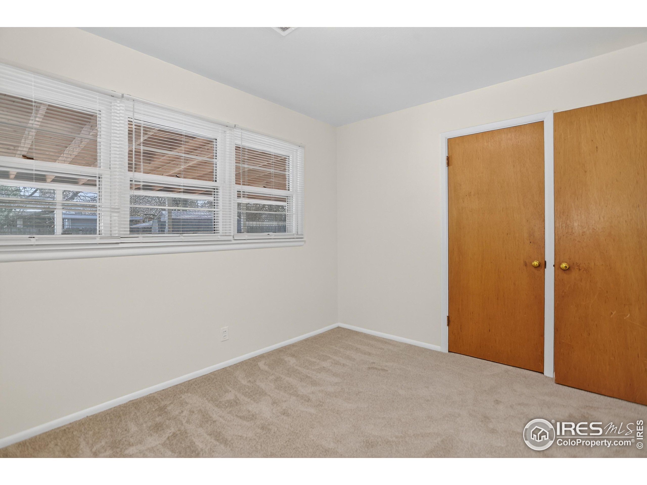 340 29th Street Boulder, CO 80305 - Photo 27 of 39 a view of an empty room with a window