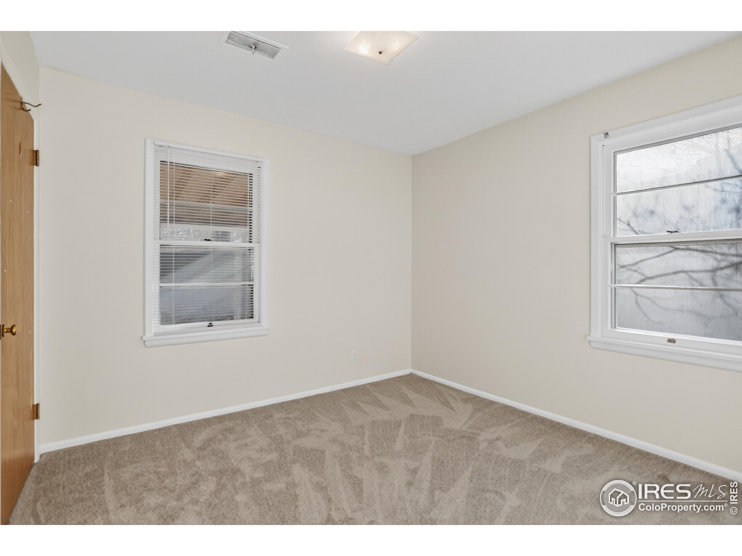 340 29th Street Boulder, CO 80305 - Photo 28 of 39 an empty room with windows and closet