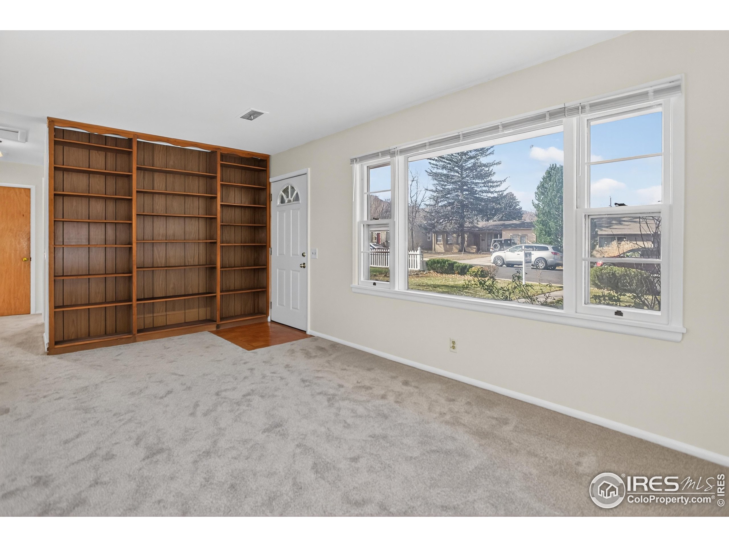 340 29th Street Boulder, CO 80305 - Photo 6 of 39 a view of an empty room with a window