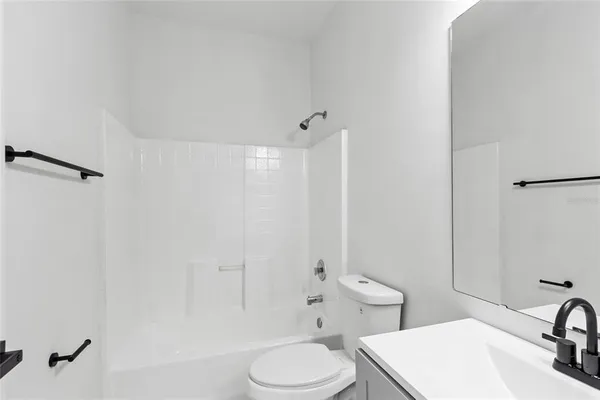 a view of entryway with stairs and wooden floor