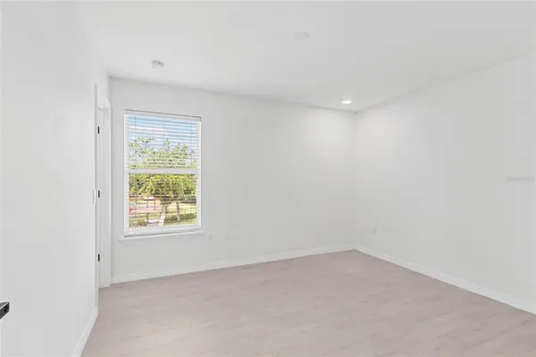 an empty room with a window