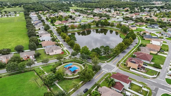an aerial view of residential house with outdoor space
