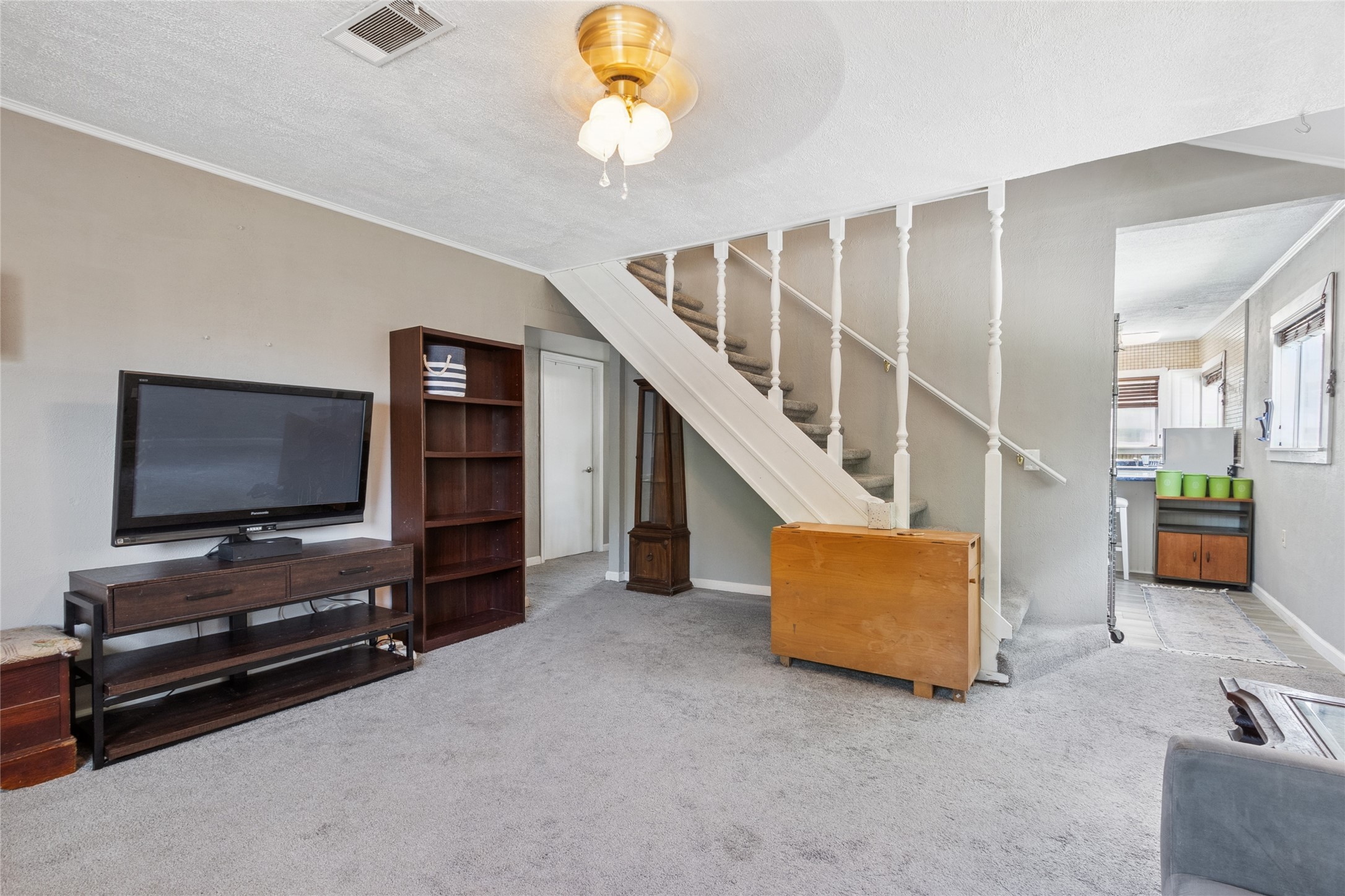 4820 Palmetto Street Bacliff, TX 77518 - Photo 6 of 22 a living room with furniture and a flat screen tv