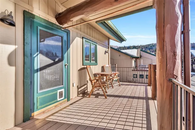 a view of a porch with furniture