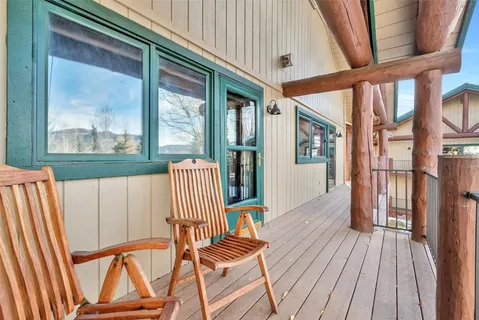 a view of outdoor space with deck and furniture