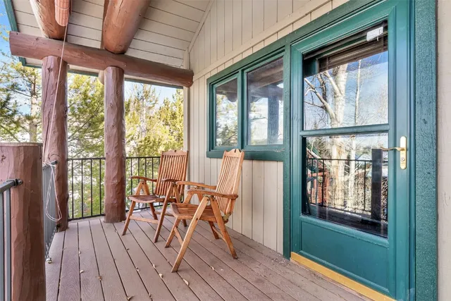 a view of outdoor space with deck and furniture