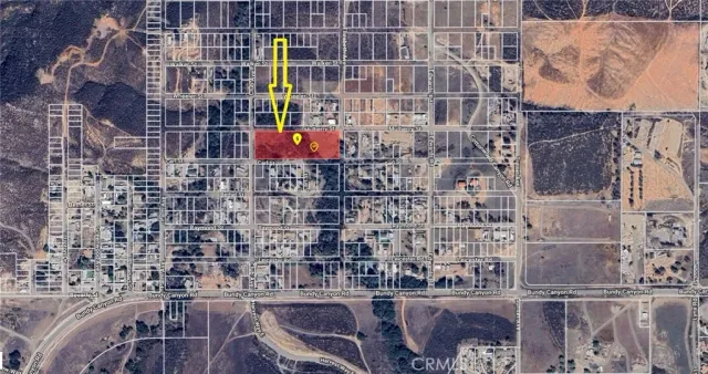 a view of a road with a building in the background