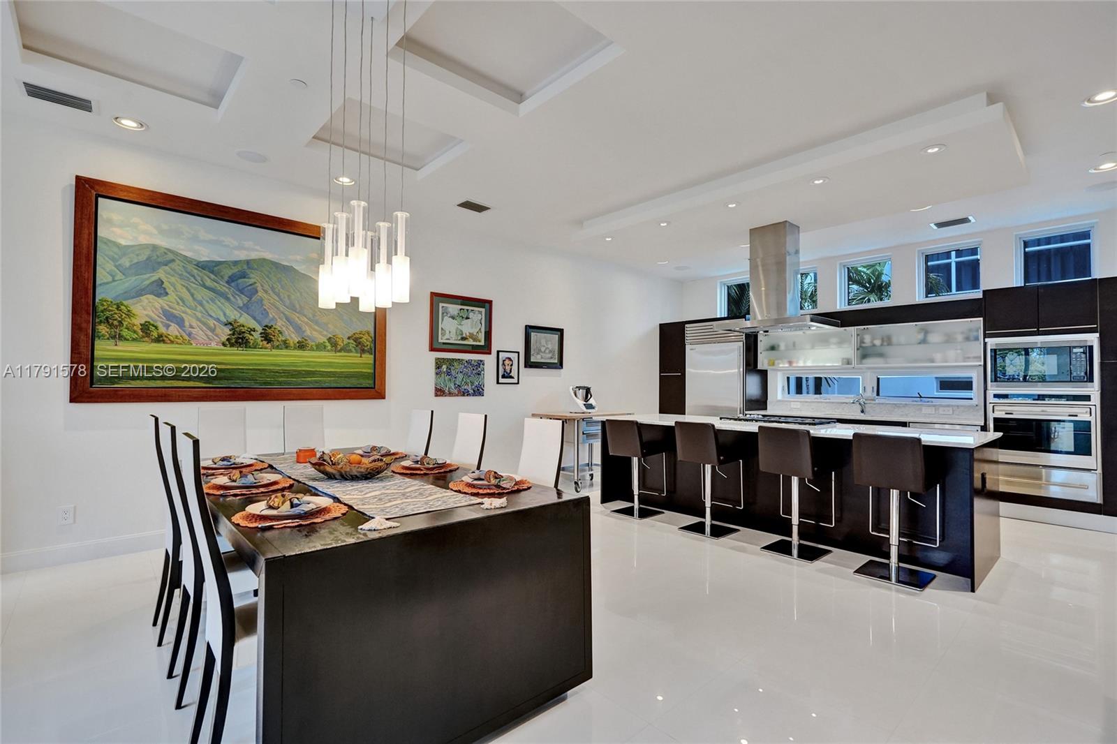 2725 Northeast 1st Street Pompano Beach, FL 33062 - Photo 21 of 59 a view of a dining room with furniture