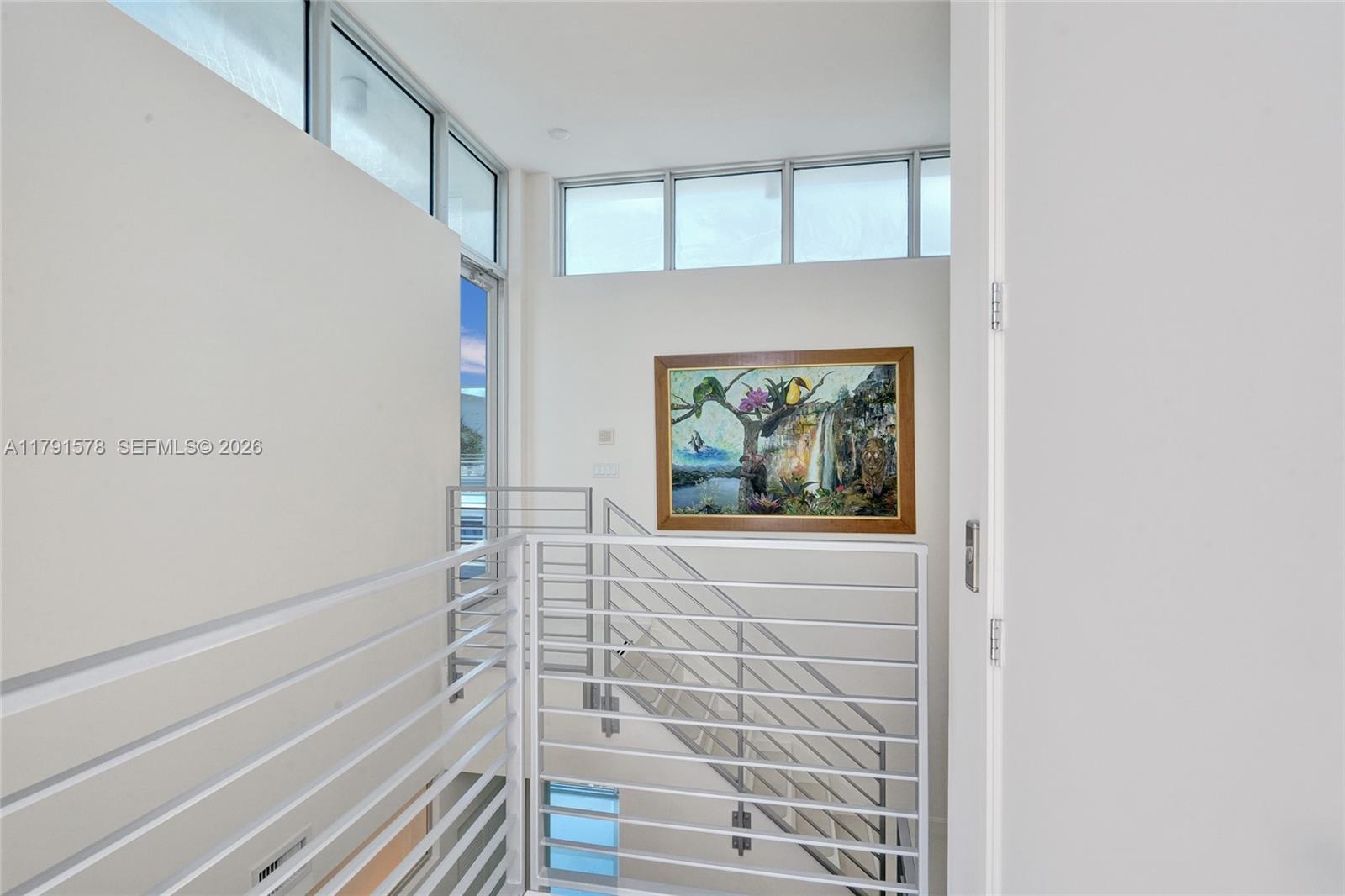 2725 Northeast 1st Street Pompano Beach, FL 33062 - Photo 42 of 59 a bathroom with a shower and a window
