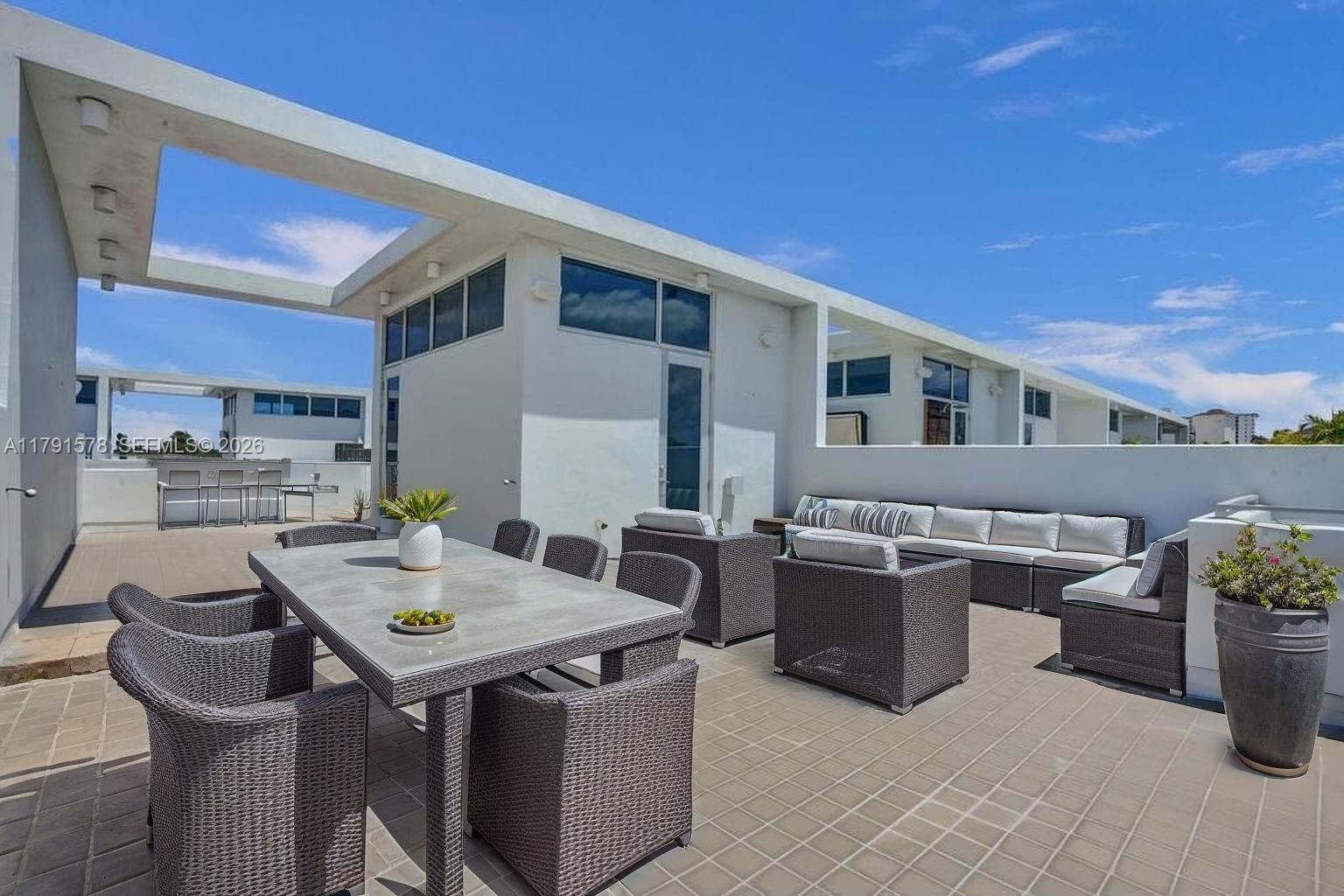 2725 Northeast 1st Street Pompano Beach, FL 33062 - Photo 44 of 59 a view of kitchen with oven and stove