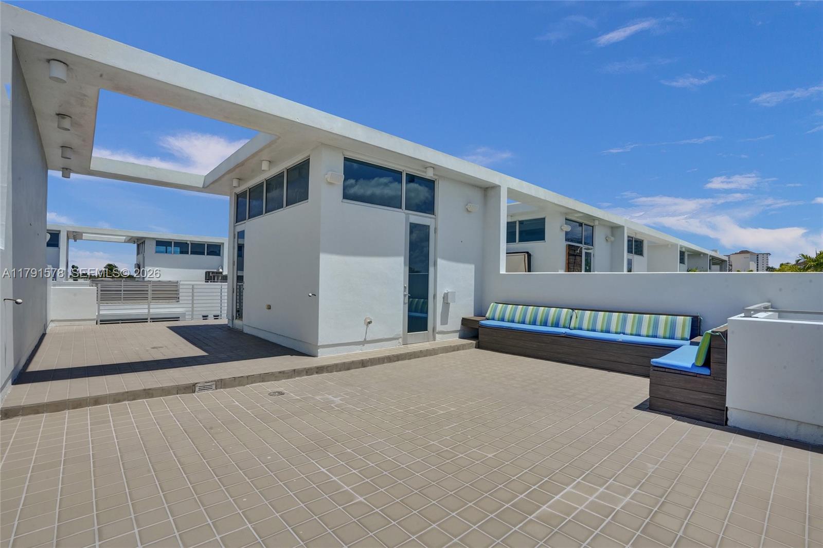 2725 Northeast 1st Street Pompano Beach, FL 33062 - Photo 49 of 59 a view of a house with a patio