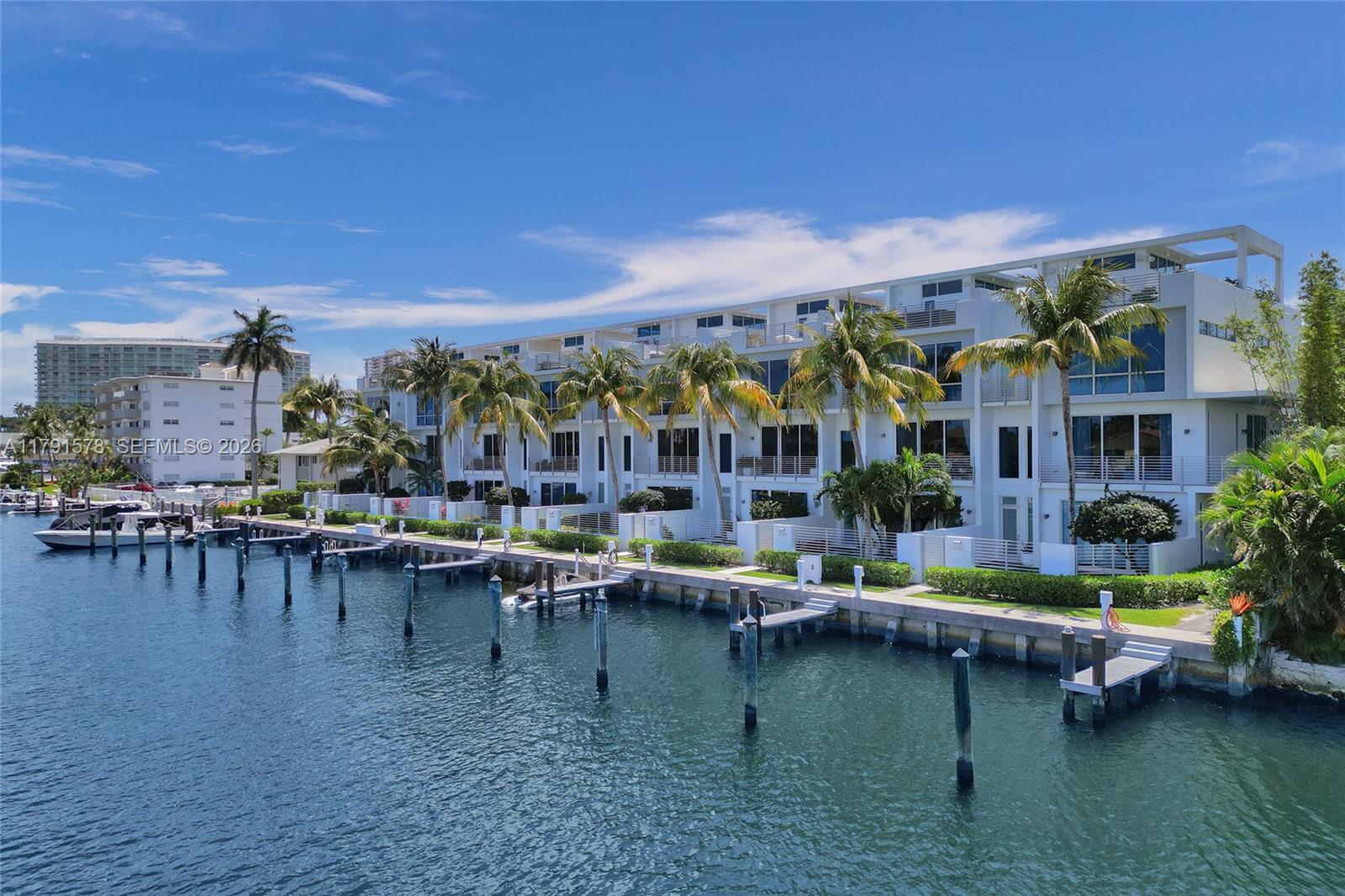 2725 Northeast 1st Street Pompano Beach, FL 33062 - Photo 56 of 59 a view of houses with swimming pool and outdoor seating