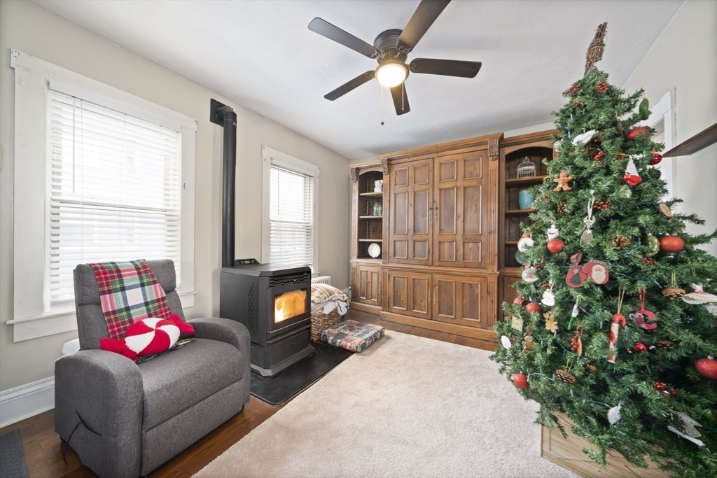 73 Monroe Street Abington, MA 02351 - Photo 6 of 28 a living room with furniture and a potted plant