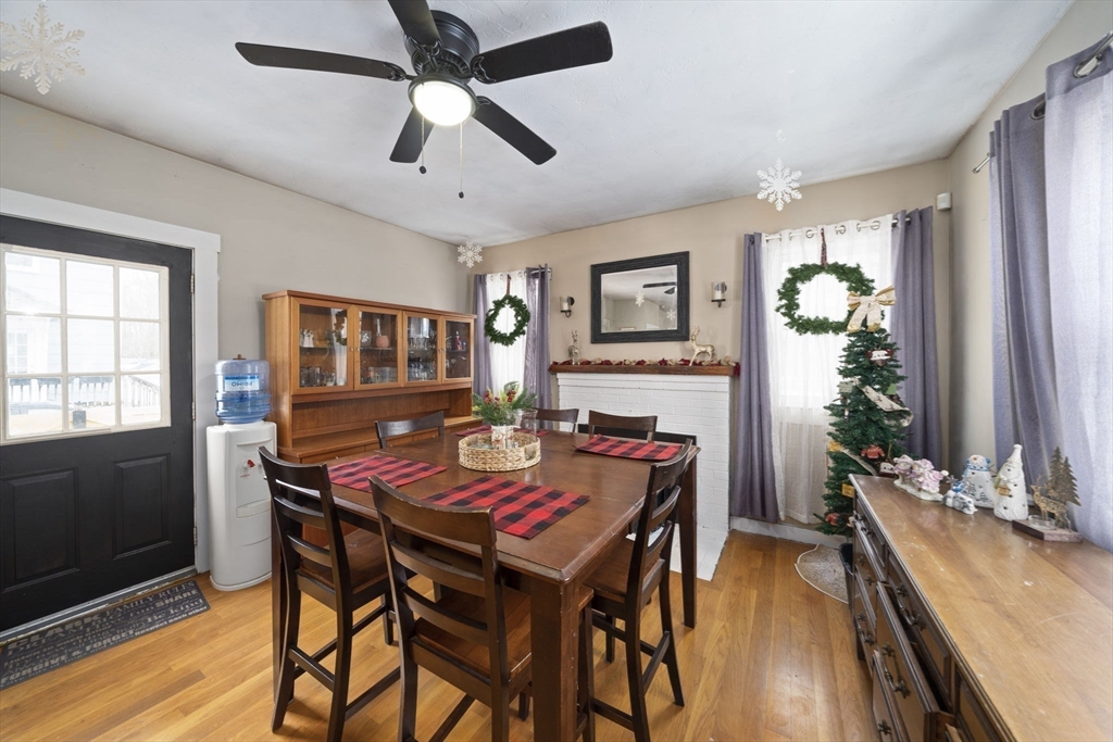 73 Monroe Street Abington, MA 02351 - Photo 9 of 28 a view of a dining room with furniture window and wooden floor