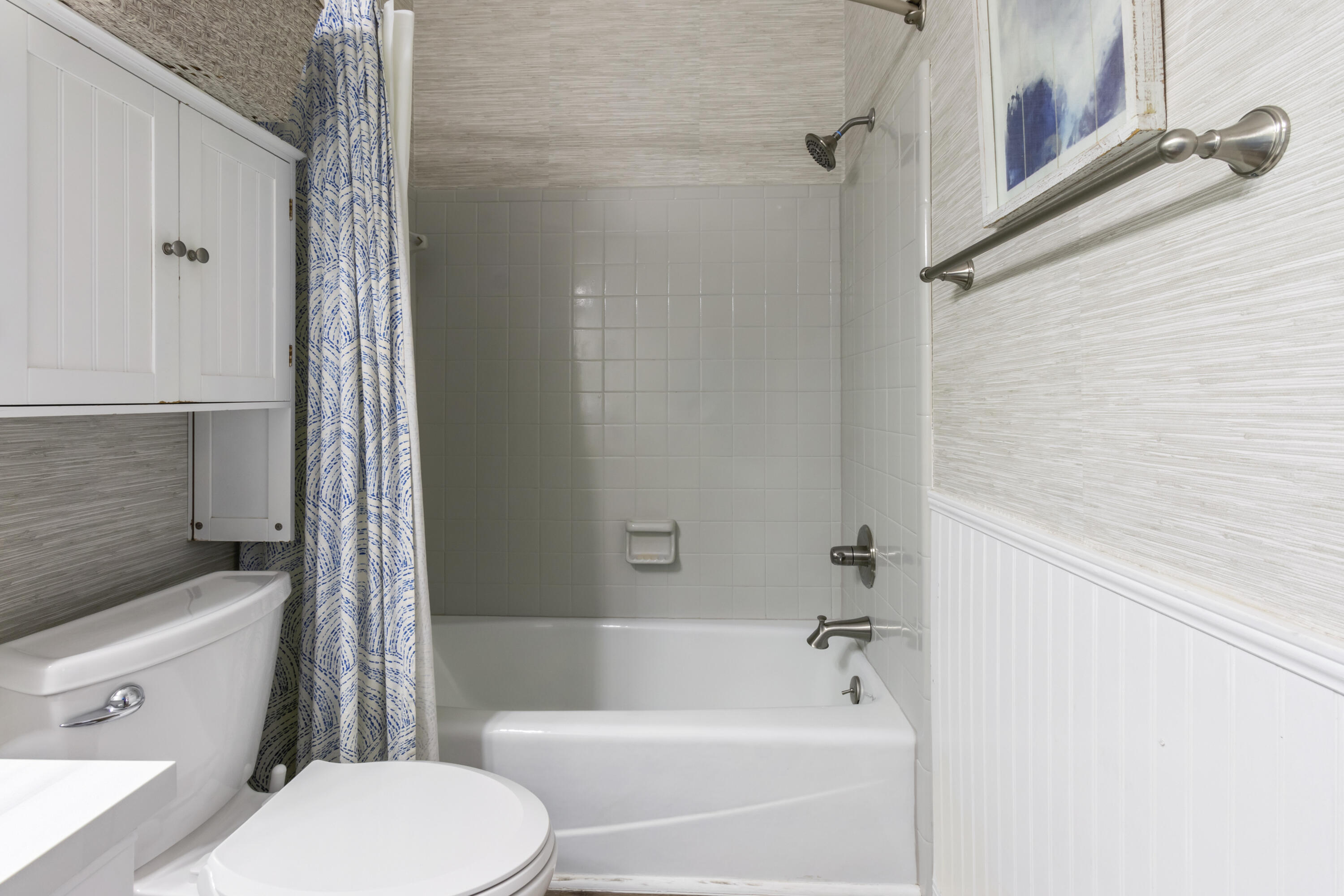 3604 East County Highway 30A, Unit B4 Santa Rosa Beach, FL 32459 - Photo 32 of 39 a bathroom with a sink a toilet and shower