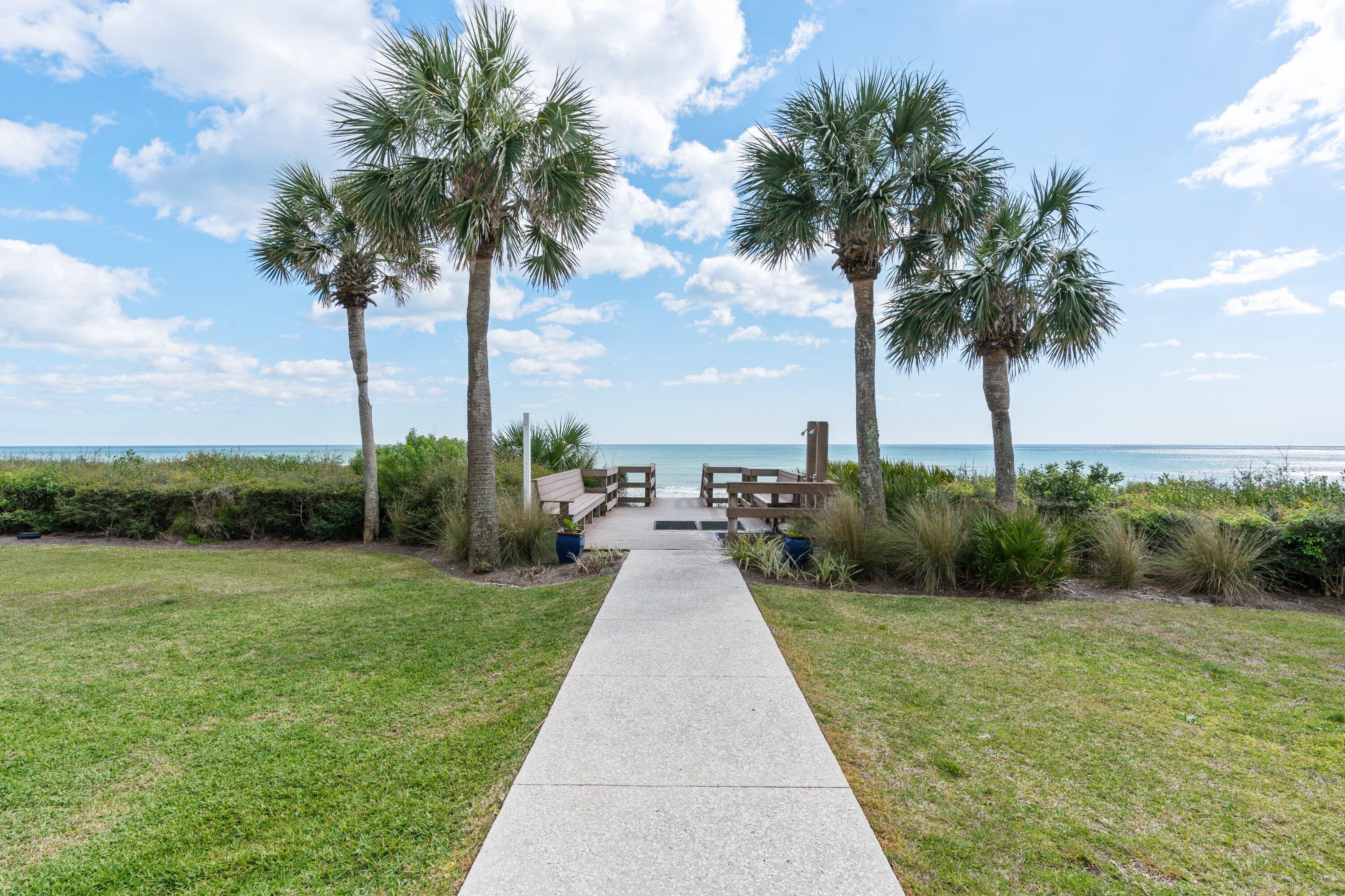 3604 East County Highway 30A, Unit B4 Santa Rosa Beach, FL 32459 - Photo 36 of 39 a view of a yard with palm trees