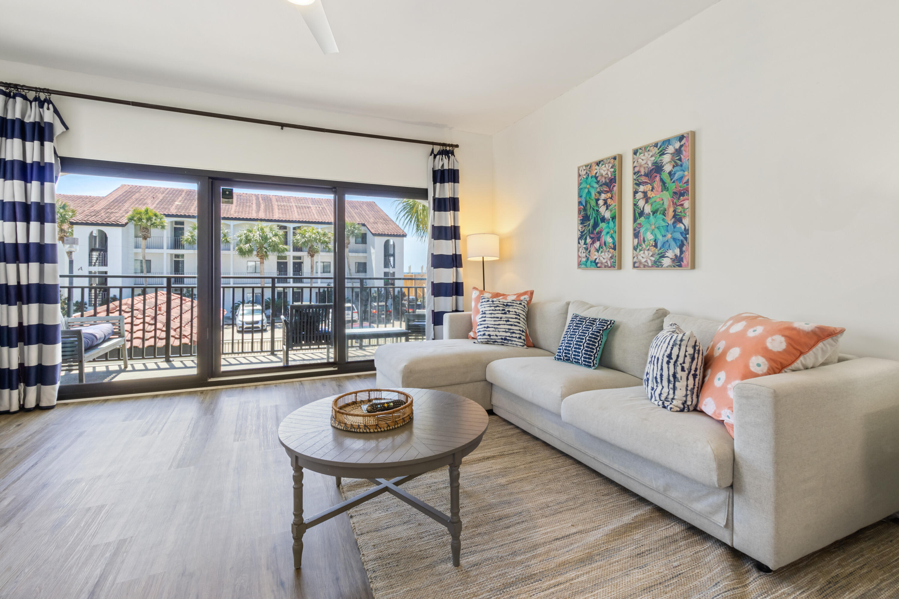3604 East County Highway 30A, Unit B4 Santa Rosa Beach, FL 32459 - Photo 4 of 39 a living room with furniture and a wooden floor