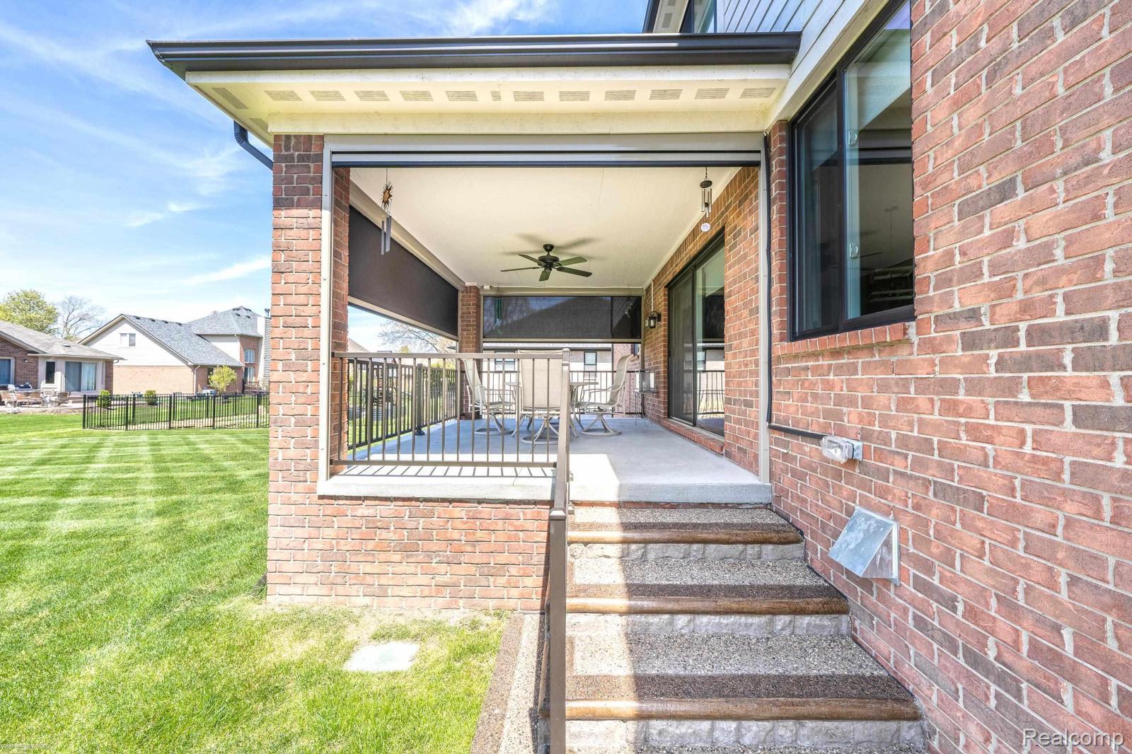 47705 Card Road Macomb, MI 48044 - Photo 49 of 53 Covered patio with a ceiling fan, recessed lighting, and retractable screens