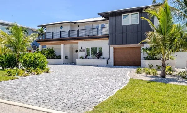 a view of a swimming pool with a lounge chair