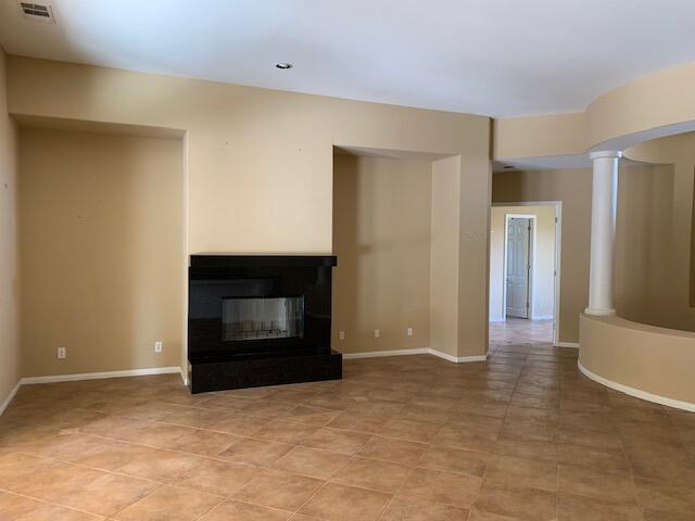 21 Napoleon Road Rancho Mirage, CA 92270 - Photo 10 of 20 a view of an empty room with a fireplace