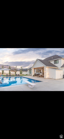 1276 West Fallow Way, Unit 76 Ogden, UT 84414 - Photo 19 of 22 Swimming pool with a patio area
