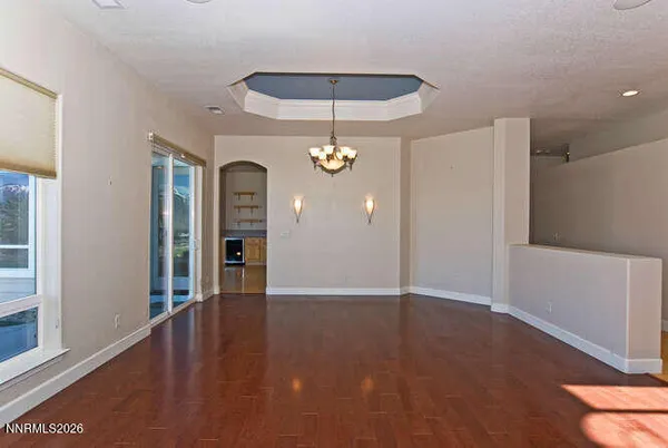 a view of a kitchen with furniture and a fireplace