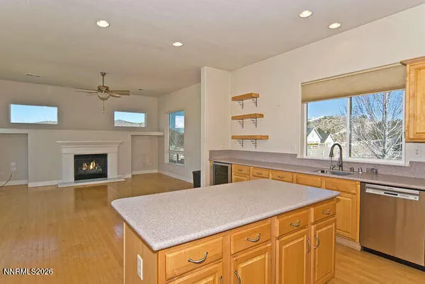 a stove top oven sitting inside of a kitchen
