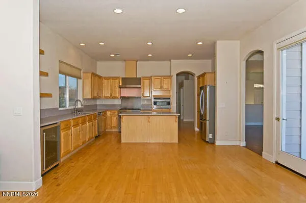 a view of a livingroom with wooden floor