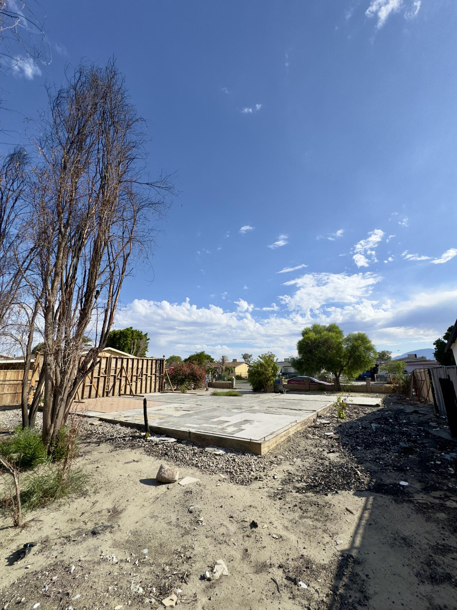 83712 Cardinal Avenue Indio, CA 92201 - Photo 2 of 3 a view of a yard with wooden fence