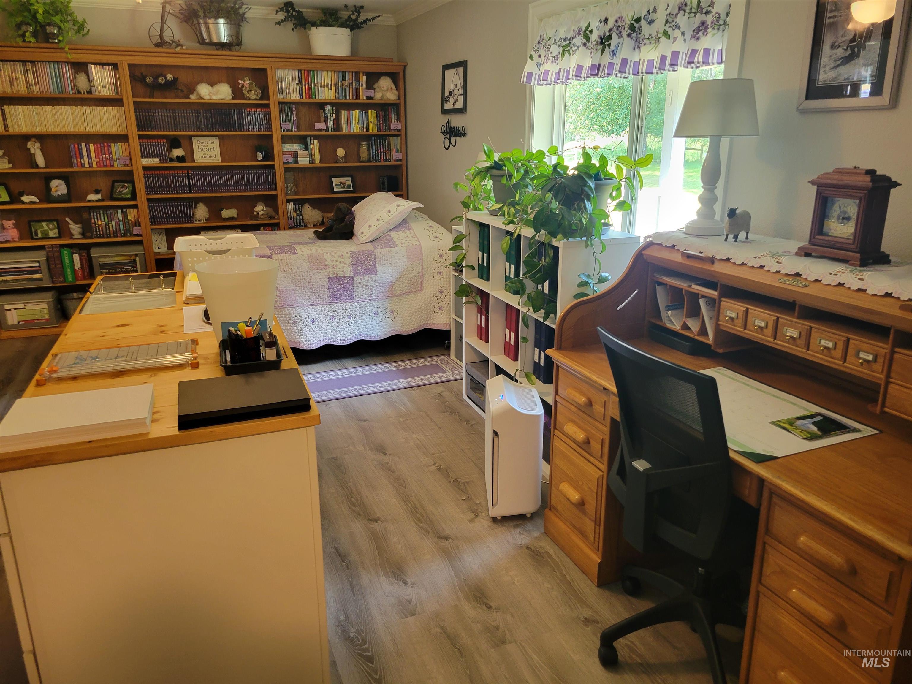 437 Clearcreek Road Kooskia, ID 83539 - Photo 24 of 45 Office space with light wood-type flooring and crown molding