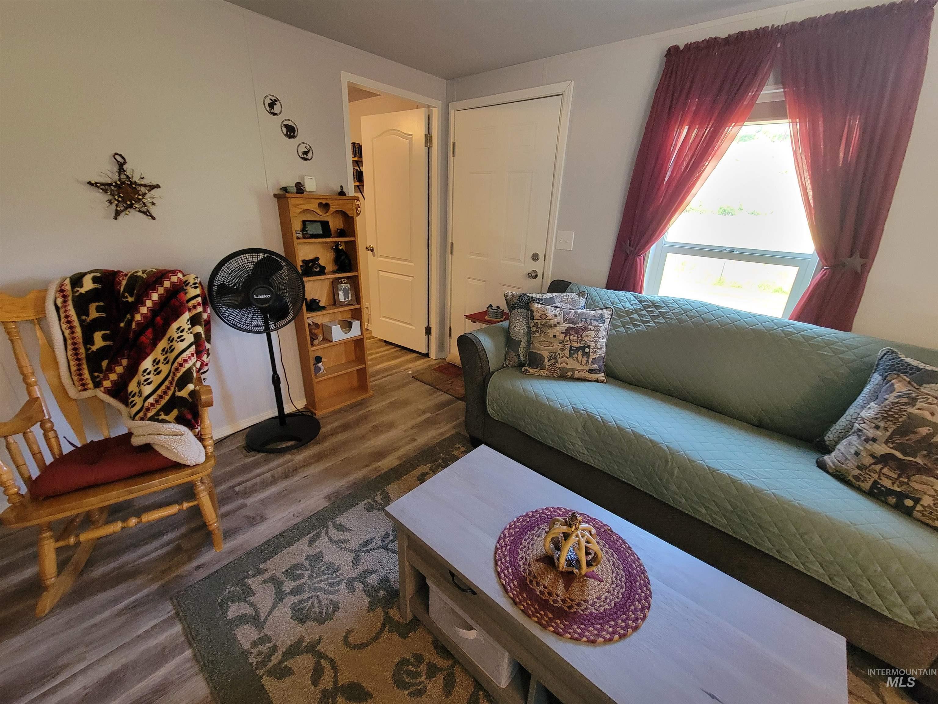 437 Clearcreek Road Kooskia, ID 83539 - Photo 39 of 45 Living room featuring wood finished floors