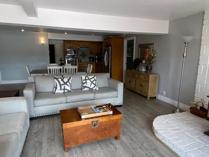 a bedroom with a bed and a table