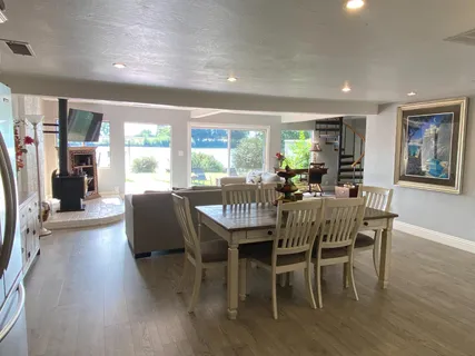 a view of a dining room with furniture