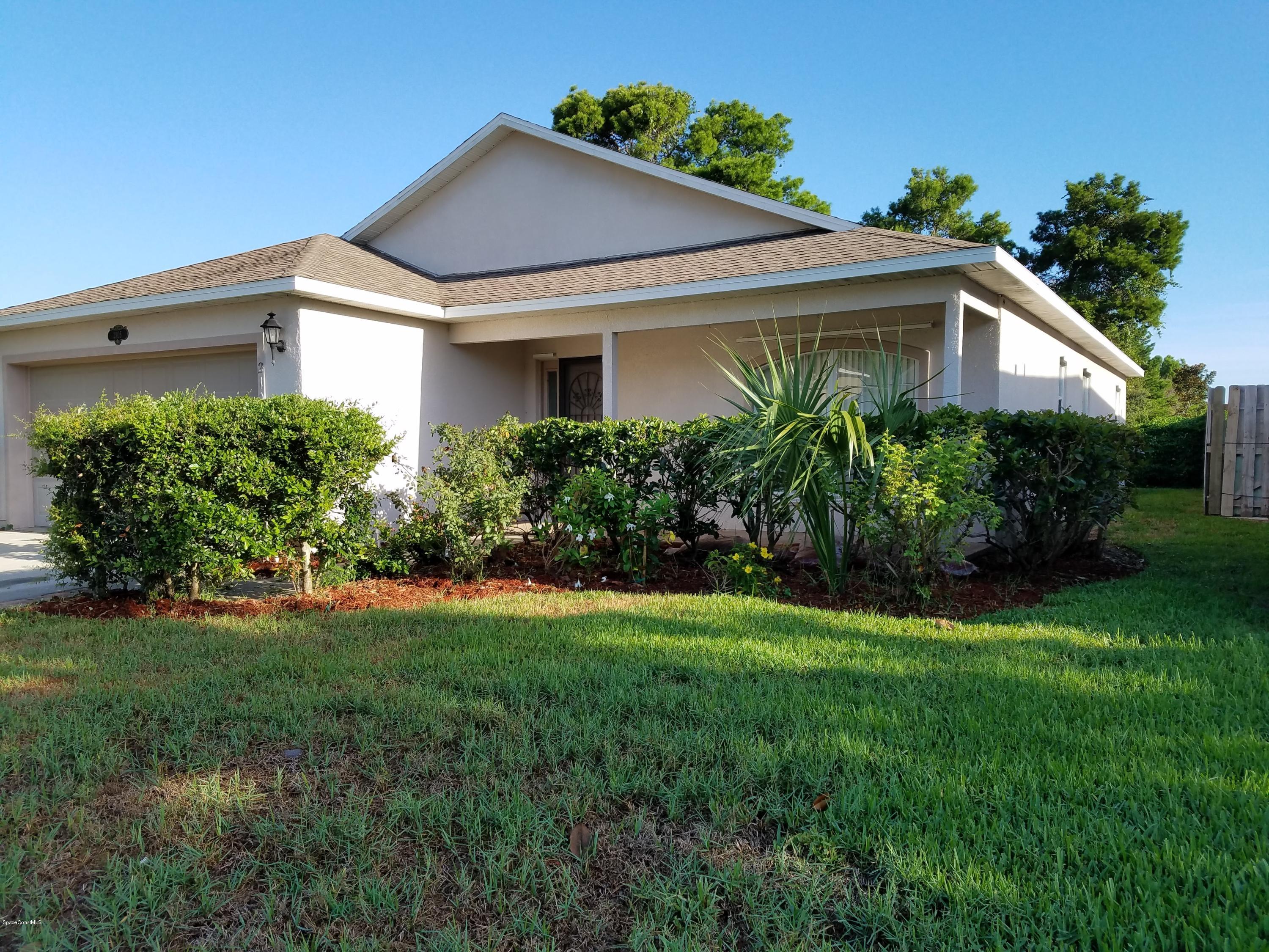 2105 Spring Creek Circle Palm Bay, FL 32905 - Photo 2 of 25 Front