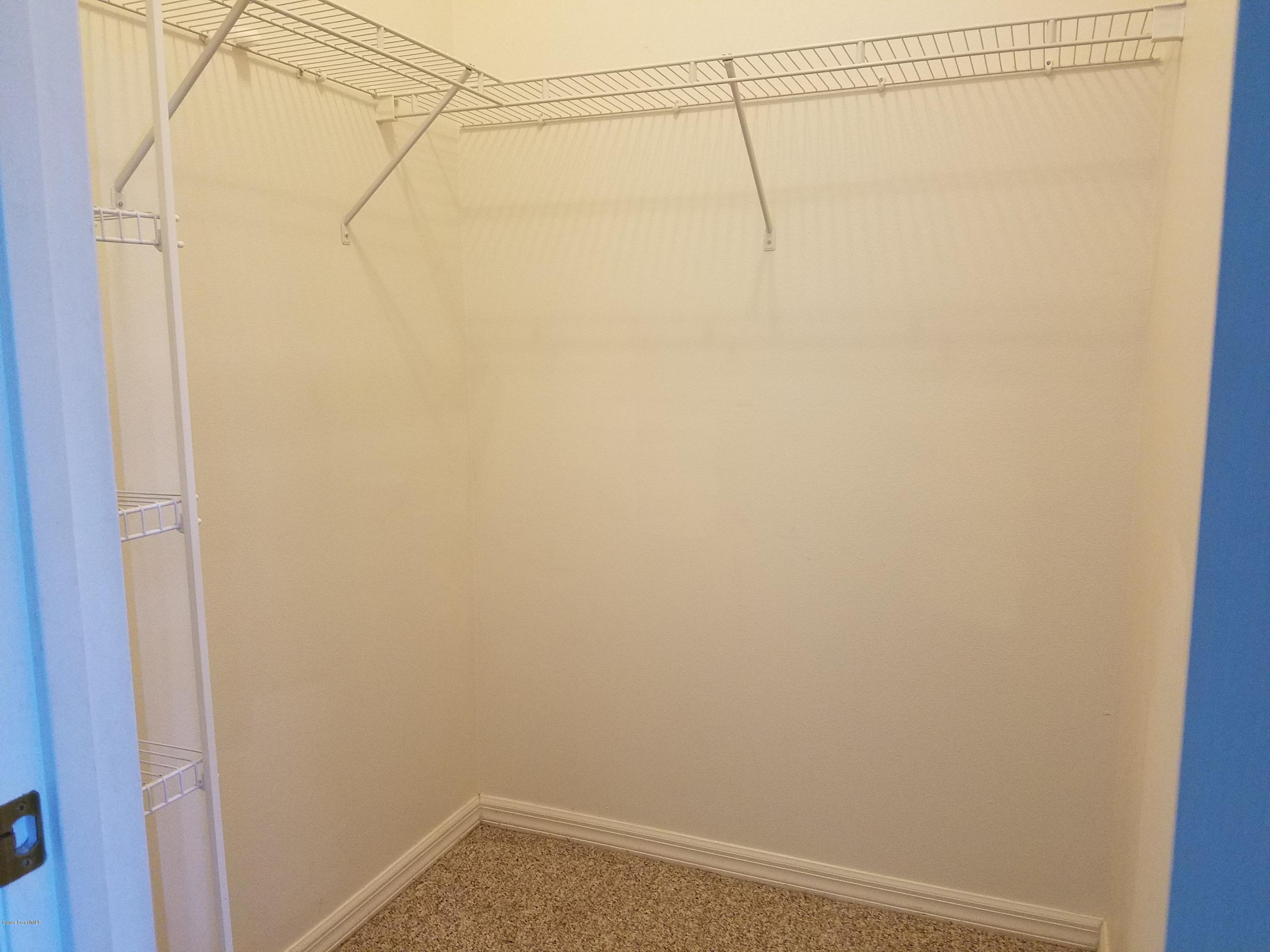 2105 Spring Creek Circle Palm Bay, FL 32905 - Photo 12 of 25 Master Walk-in Closet