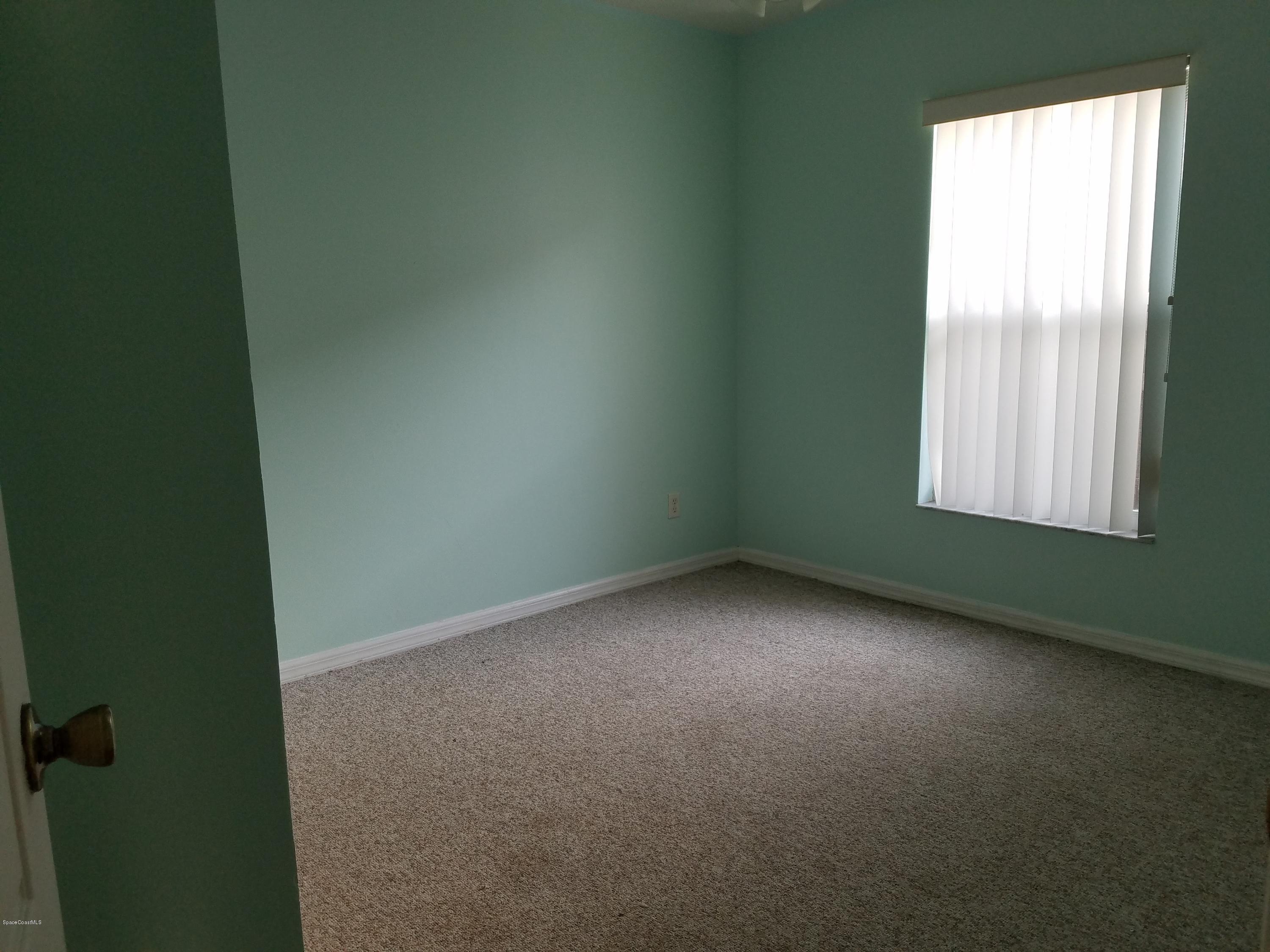 2105 Spring Creek Circle Palm Bay, FL 32905 - Photo 15 of 25 Guest room