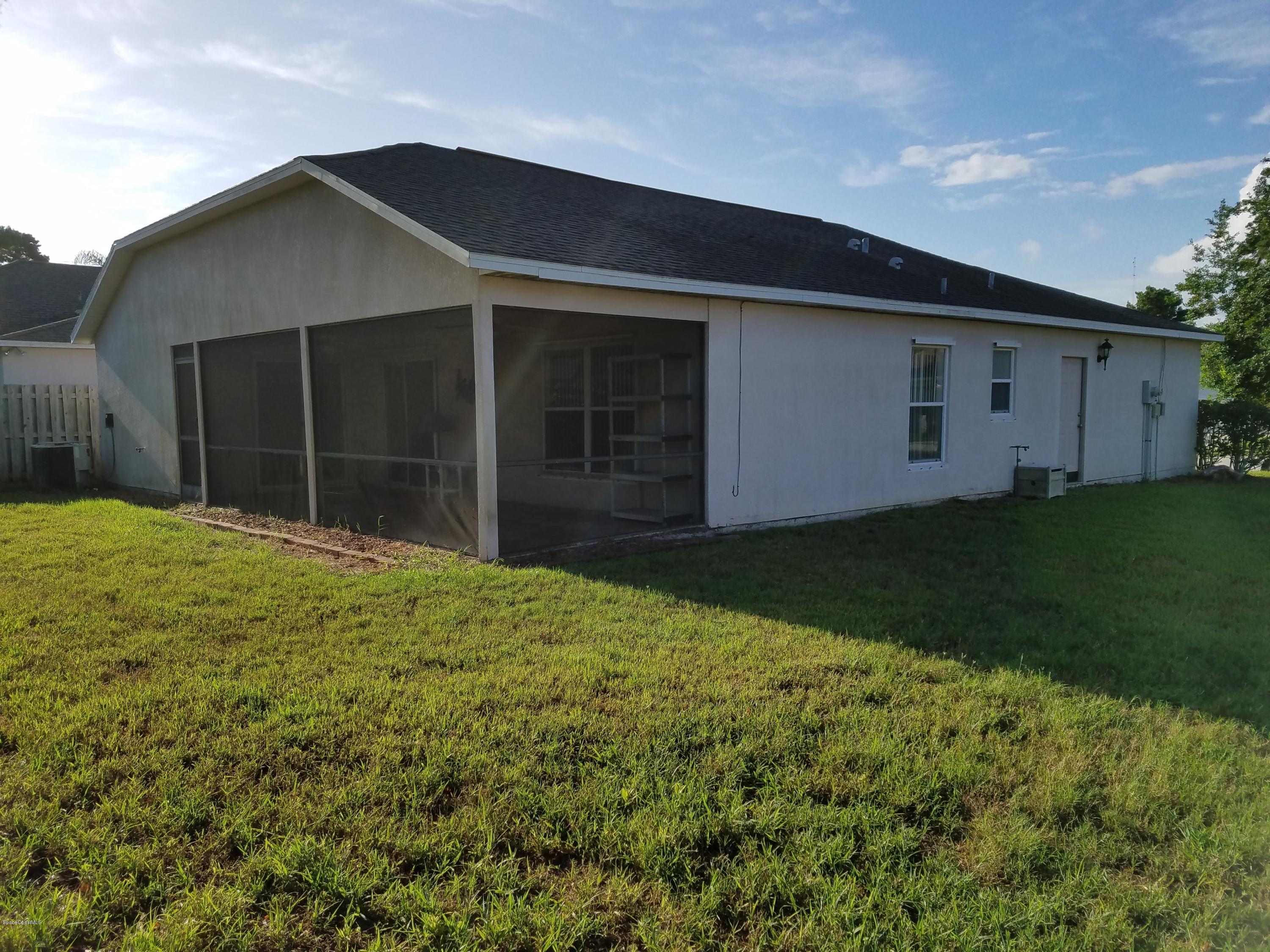 2105 Spring Creek Circle Palm Bay, FL 32905 - Photo 18 of 25 Rear view