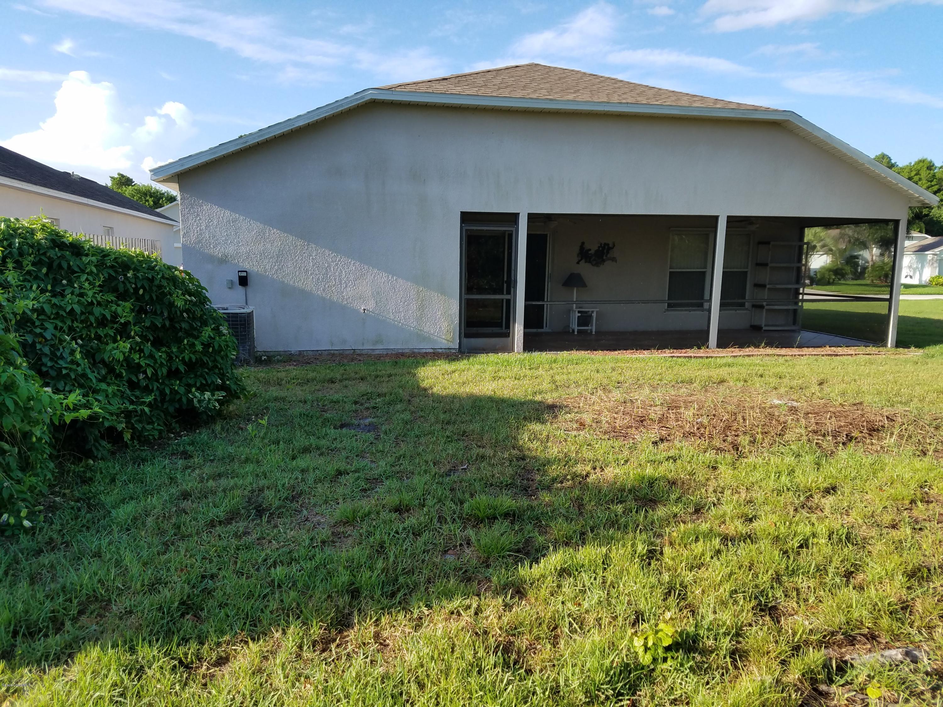 2105 Spring Creek Circle Palm Bay, FL 32905 - Photo 19 of 25 Rear view