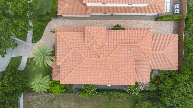 an aerial view of residential house with outdoor space