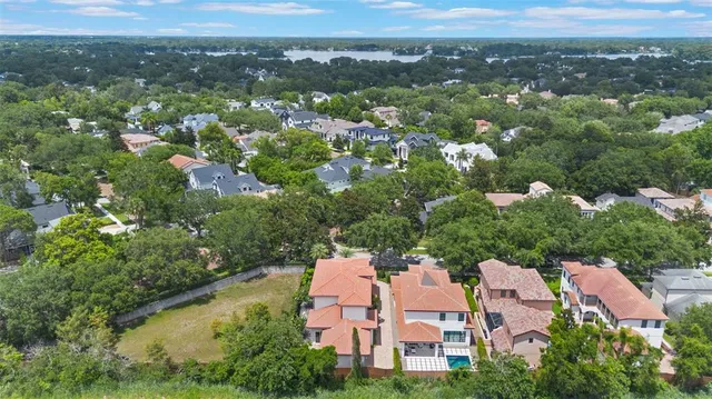 a backyard of a house with lots of green space