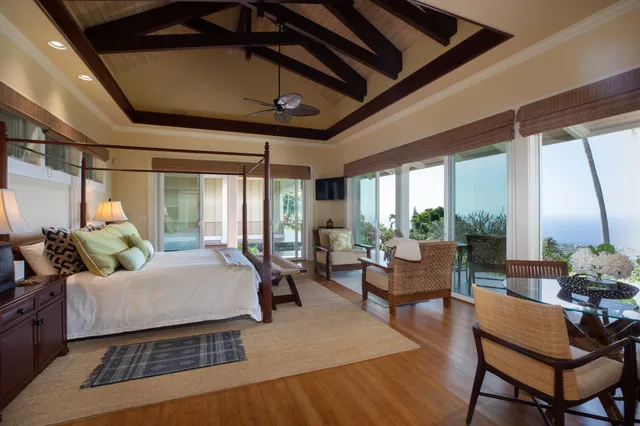 a bathroom with a granite countertop sink mirror and shower