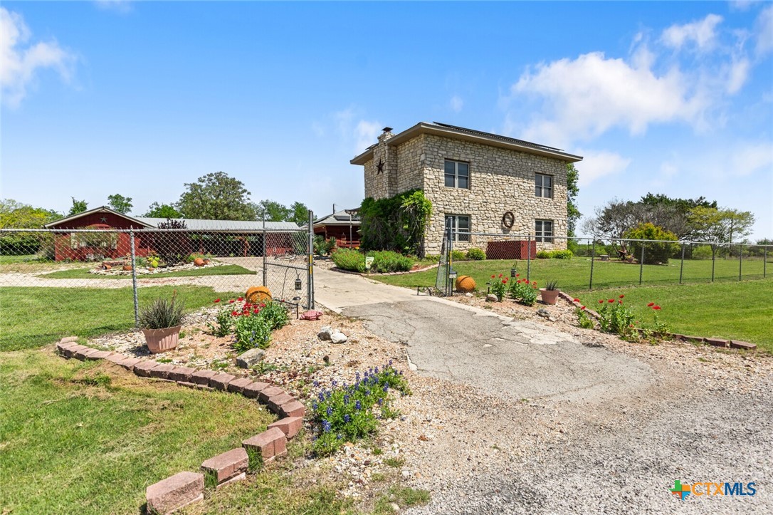 1024 Backstrom Crossing Belton, TX 76513 - Photo 2 of 47 a view of a house with a yard