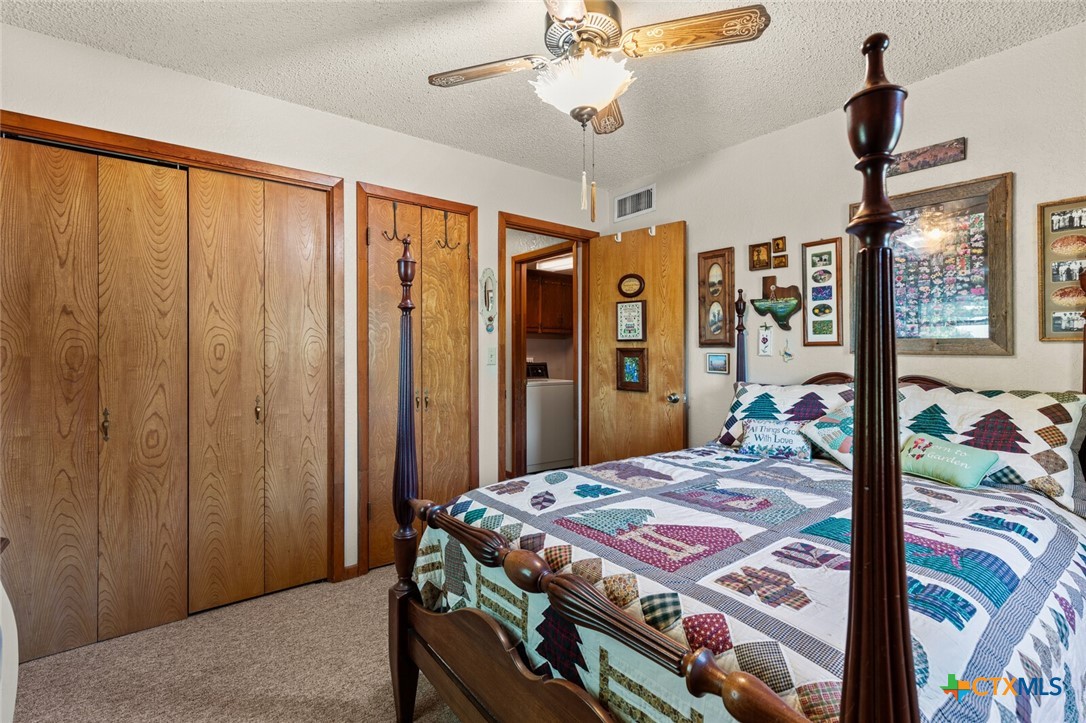 1024 Backstrom Crossing Belton, TX 76513 - Photo 26 of 47 a bedroom with a bed dresser and a window