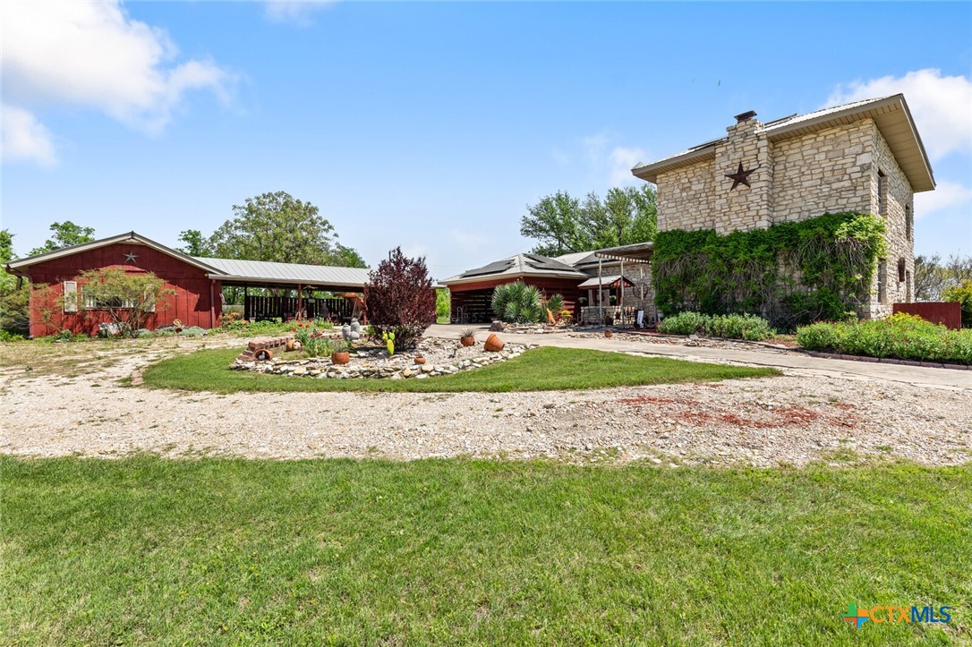 1024 Backstrom Crossing Belton, TX 76513 - Photo 3 of 47 a view of a house with a big yard