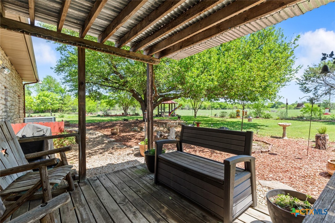 1024 Backstrom Crossing Belton, TX 76513 - Photo 31 of 47 a view of a wooden deck with a bench