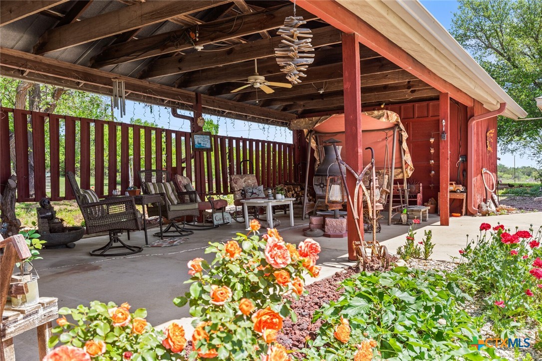 1024 Backstrom Crossing Belton, TX 76513 - Photo 35 of 47 a view of a patio with table and chairs and potted plants