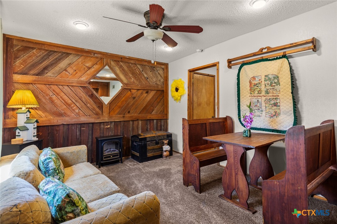 1024 Backstrom Crossing Belton, TX 76513 - Photo 39 of 47 a living room with furniture a ceiling fan and a window