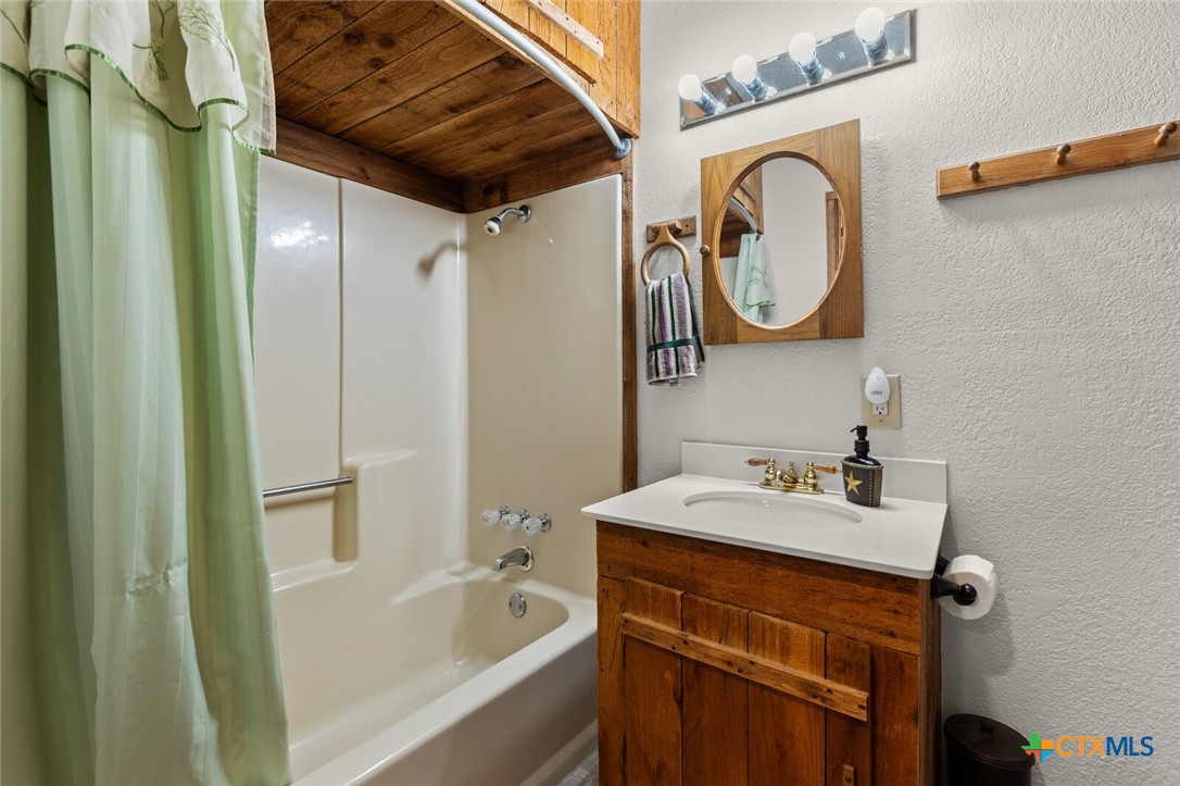 1024 Backstrom Crossing Belton, TX 76513 - Photo 44 of 47 a bathroom with a sink and a mirror