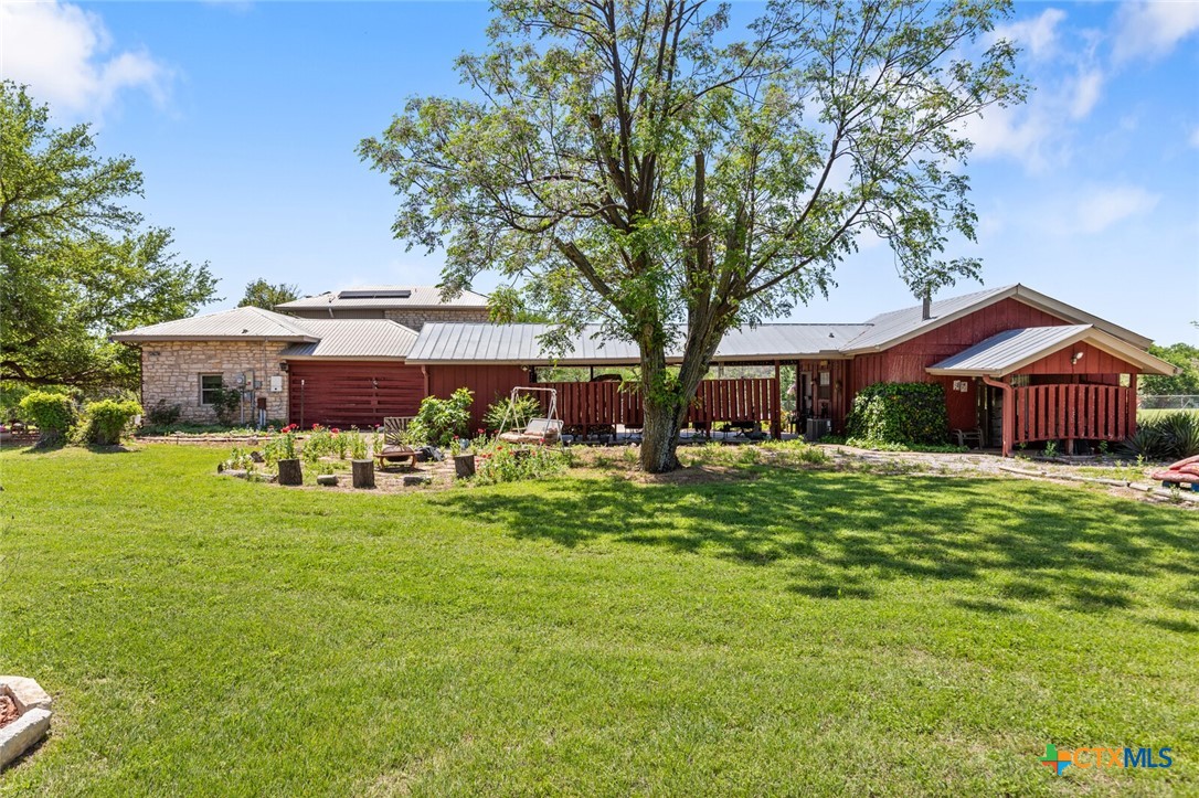 1024 Backstrom Crossing Belton, TX 76513 - Photo 46 of 47 a front view of a house with garden